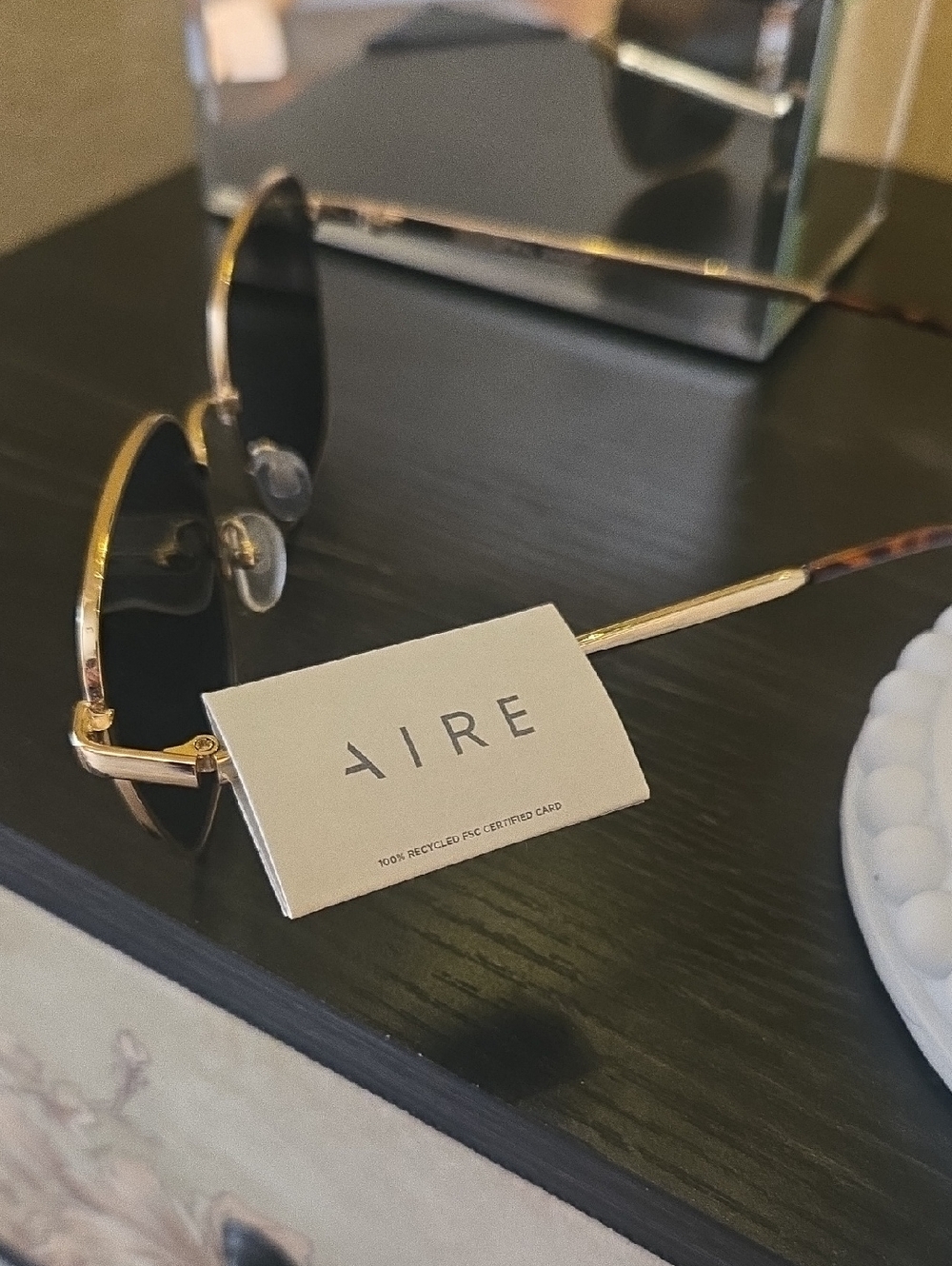 AIRE Women's Gold Frame Black Lens Sunglasses